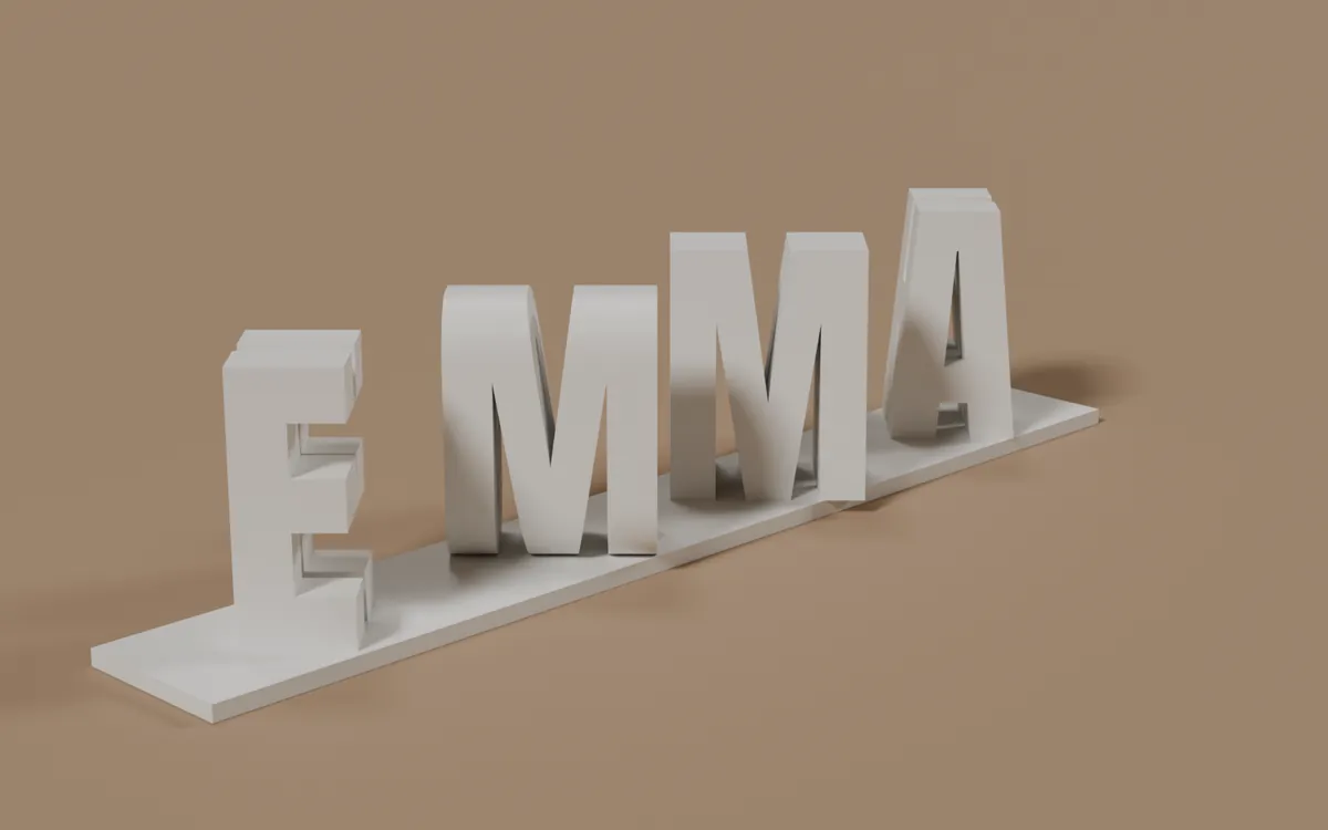3D printed flip name seen from the left, reading EMMA